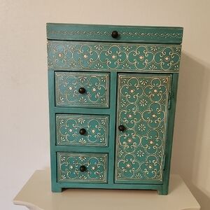 Teal Wooden Jewelry Cabinet with Intricate Design